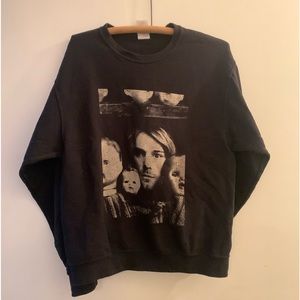 Nirvana band sweater with Kurt Cobain iconic image on it